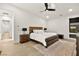 Spacious bedroom showcasing a comfortable bed, neutral decor, and tile flooring at 803 Bolide St, Las Vegas, NV 89138