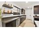 Well-appointed butler's pantry with ample counter space, cabinetry, and modern fixtures at 803 Bolide St, Las Vegas, NV 89138