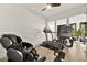 Bright exercise room featuring treadmill, exercise bike, and massage chair for ultimate relaxation and fitness at 803 Bolide St, Las Vegas, NV 89138