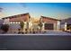 Charming modern home featuring stylish lighting, desert landscaping, and a paved driveway at 803 Bolide St, Las Vegas, NV 89138