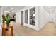 Hallway offering a view to the exercise room, kitchen, and natural light at 803 Bolide St, Las Vegas, NV 89138