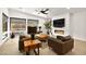 Cozy living room with stylish furniture, a modern fireplace, and bright natural lighting at 803 Bolide St, Las Vegas, NV 89138