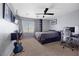 Bedroom featuring modern decor, guitar, carpet, and window with blinds at 820 Sandhill Sage St, Henderson, NV 89052