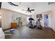 Bright home gym with an elliptical machine, treadmill, and multiple windows at 820 Sandhill Sage St, Henderson, NV 89052