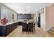 Open-concept kitchen features a large center island with bar seating and modern appliances at 820 Sandhill Sage St, Henderson, NV 89052