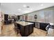 Spacious kitchen with a center island, stainless steel appliances, and direct view to fireplace at 820 Sandhill Sage St, Henderson, NV 89052