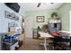 Bright home office with shelving, work areas, and natural light at 820 Sandhill Sage St, Henderson, NV 89052