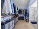 Organized walk-in closet with custom shelving, hanging racks, and built-in storage at 820 Sandhill Sage St, Henderson, NV 89052