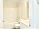 Bright bathroom featuring a tub and shower combination and a white vanity at 8237 New Leaf Ave, Las Vegas, NV 89131