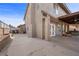 Expansive backyard with covered patio and access to the living area at 8912 Dio Guardi Dr, Las Vegas, NV 89117