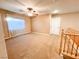 Upstairs loft space with carpeted flooring and natural light, offering flexible living at 8149 Sandy Slope Ct, Las Vegas, NV 89113