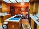 Kitchen includes custom wood cabinetry, granite countertops, and modern appliances at , Mount Charleston, NV 89124