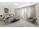 Serene bedroom with neutral tones, plush carpeting, and abundant natural light at 10016 Copper Edge Rd, Las Vegas, NV 89148
