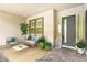 Inviting front porch with comfortable seating and stylish accents. A cozy and welcoming entrance at 10016 Copper Edge Rd, Las Vegas, NV 89148