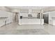 Modern kitchen with a large center island, stainless steel appliances, and abundant storage at 10016 Copper Edge Rd, Las Vegas, NV 89148