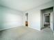 View of a carpeted room with access to the bathroom and hallway at 10105 Prattville Ave, Las Vegas, NV 89148