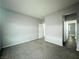 Neutral bedroom with closet, entry door, and convenient hall access at 10105 Prattville Ave, Las Vegas, NV 89148