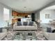 Open-concept living room, seamlessly flowing into the kitchen and dining area at 10105 Prattville Ave, Las Vegas, NV 89148