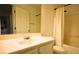 Bright bathroom with neutral color palette featuring a shower-tub combo and vanity at 10596 Corte Sierra St, Las Vegas, NV 89183