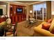 Cozy living room with comfortable seating and views of the city skyline at 135 E Harmon Ave # 307, Las Vegas, NV 89109