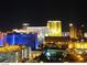 Stunning night view of the city skyline with illuminated buildings at 135 E Harmon Ave # 307, Las Vegas, NV 89109