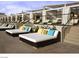 Relaxing poolside cabanas with comfortable seating and shaded areas at 135 E Harmon Ave # 307, Las Vegas, NV 89109