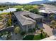 Aerial view of a home near a golf course and lake at 15 Reflection Bay Dr, Henderson, NV 89011