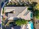 Overhead view showcasing a roof, pool, and outdoor living area in a luxury backyard at 15 Reflection Bay Dr, Henderson, NV 89011