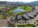 Overhead capture showcasing a residential area adjacent to a beautiful golf course and lake at 15 Reflection Bay Dr, Henderson, NV 89011