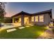 An outdoor living space with a small pool and artificial grass at 15 Reflection Bay Dr, Henderson, NV 89011