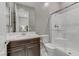 Neutral bathroom with glass shower and undermount sink in a dark vanity at 15 Reflection Bay Dr, Henderson, NV 89011