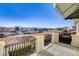 Balcony with wrought iron railing offering panoramic views of the neighborhood and distant mountains at 1883 Nature Park Dr, North Las Vegas, NV 89084