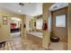 Spacious bathroom featuring a soaking tub, walk-in shower, and a window offering natural light at 1883 Nature Park Dr, North Las Vegas, NV 89084