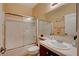 Clean bathroom featuring a shower-tub, stylish vanity and an organized countertop at 1883 Nature Park Dr, North Las Vegas, NV 89084