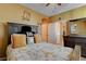 Comfortable bedroom featuring a neutral palette and a well-coordinated decor at 1883 Nature Park Dr, North Las Vegas, NV 89084