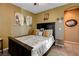 Inviting bedroom featuring a decorative rug and comfortable bedding and pillows at 1883 Nature Park Dr, North Las Vegas, NV 89084