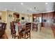 Open concept dining room showcasing stylish pendant lighting and a seamless connection to the kitchen at 1883 Nature Park Dr, North Las Vegas, NV 89084