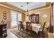 Inviting dining room featuring a chandelier and a decorative china cabinet at 1883 Nature Park Dr, North Las Vegas, NV 89084