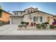 Charming two-story home with well-manicured landscaping and a spacious two-car garage at 1883 Nature Park Dr, North Las Vegas, NV 89084