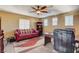 Cozy upstairs living room with ample natural light, a desk, and comfortable seating at 1883 Nature Park Dr, North Las Vegas, NV 89084