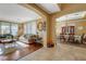 Bright living room and dining room featuring comfortable seating and natural light at 1883 Nature Park Dr, North Las Vegas, NV 89084