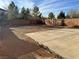 Backyard featuring a concrete patio and a view of the property line's block fence at 2037 Houdini St, Henderson, NV 89002