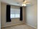 Serene bedroom featuring carpeted floors, neutral walls, and a window with privacy blinds at 2037 Houdini St, Henderson, NV 89002