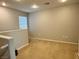 Cozy bedroom with plush carpet, neutral walls, and a window offering natural light at 2037 Houdini St, Henderson, NV 89002