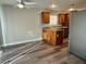 Open-concept kitchen with stainless steel appliances seamlessly connecting to the dining area at 2037 Houdini St, Henderson, NV 89002