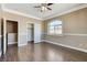 Cozy bedroom features a ceiling fan, closet and view to the mountains at 21 Bridal Falls Ct, Las Vegas, NV 89148