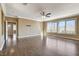 Bright and open living room with wood floors and multiple access points at 21 Bridal Falls Ct, Las Vegas, NV 89148