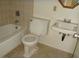 Bathroom including a toilet, sink, and bathtub at 224 S Wallace Dr, Las Vegas, NV 89107