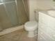 Bathroom featuring a shower, toilet, and sink at 224 S Wallace Dr, Las Vegas, NV 89107