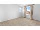 Bedroom with neutral walls and carpets with the view of a neighboring home at 2300 Trasimeno Pl, Henderson, NV 89044